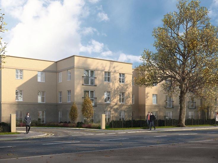 a building with trees in front