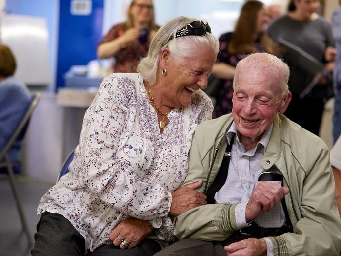a woman and an old man