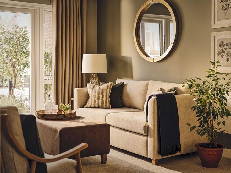 a living room with a couch and a table