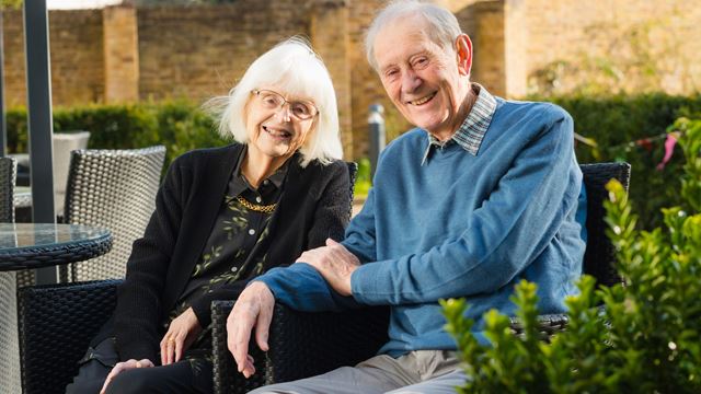 a man and woman sitting together
