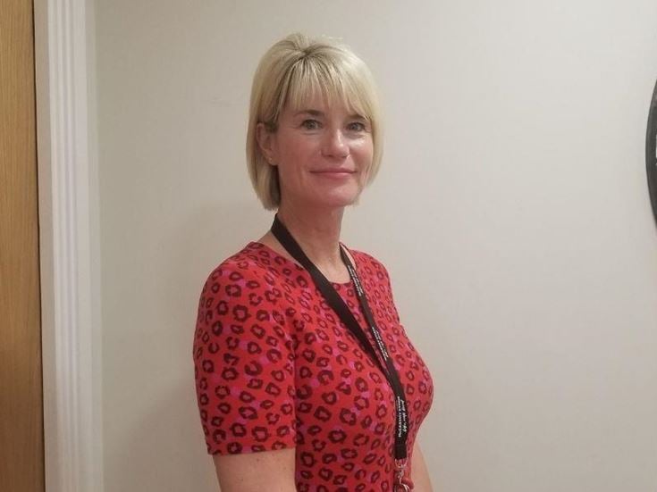a woman in a red dress