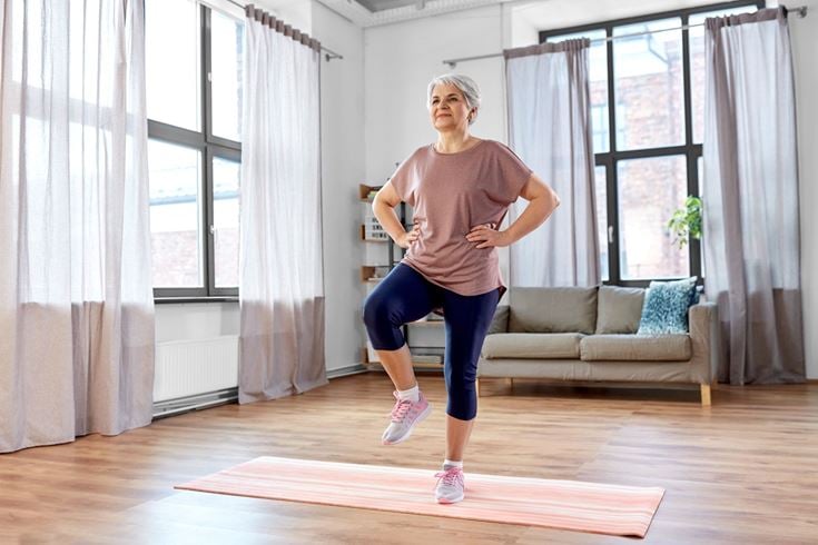 a person exercising in a room
