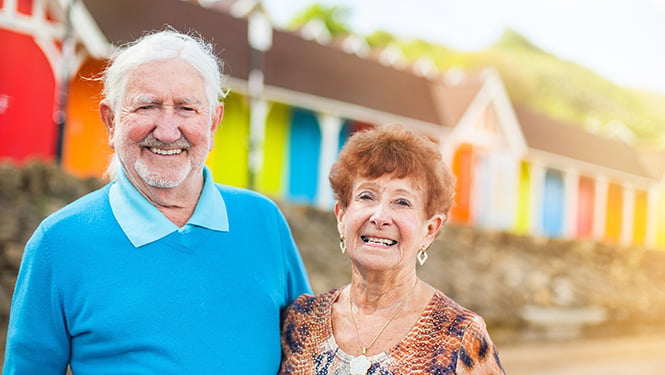 a man and woman smiling