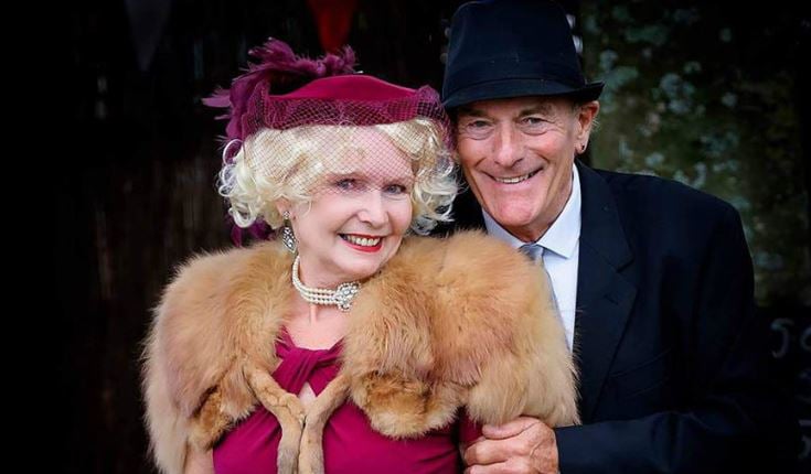 a man and woman smiling