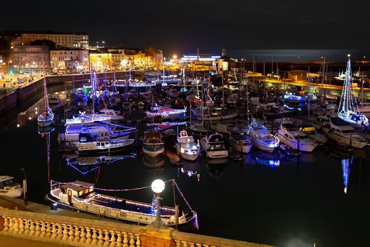 Ramsgate harbor full of boats with Christmas lights