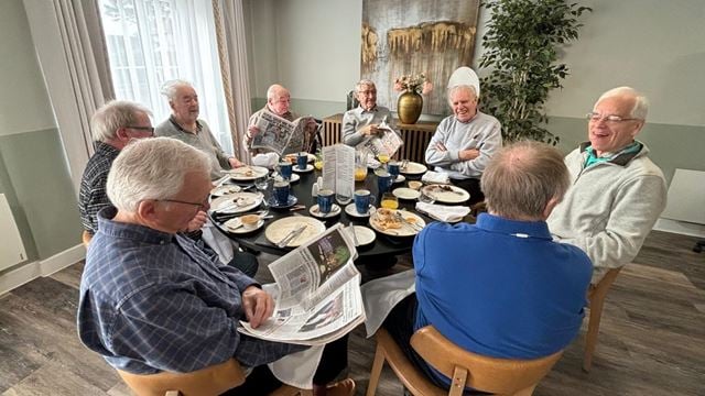 Men enjoying brunch, one of the retired men’s clubs at McCarthy & Stone communities