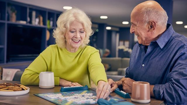 McCarthy & Stone homeowners play scrabble at their retirement living community