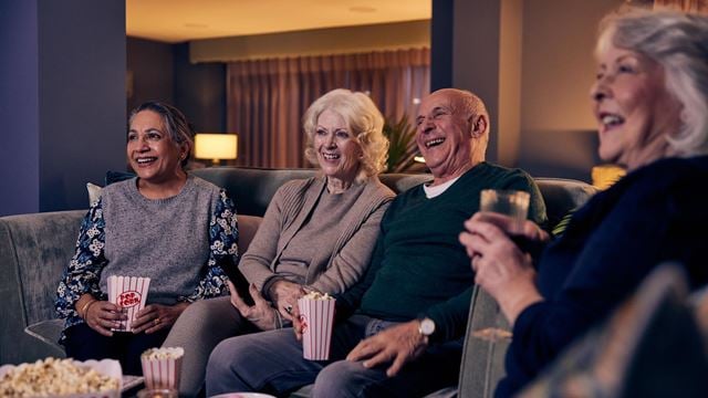 a group of people sitting on a couch