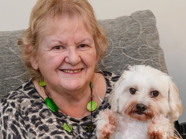 Applegate House homeowner Mary Strange and her dog Pepsi