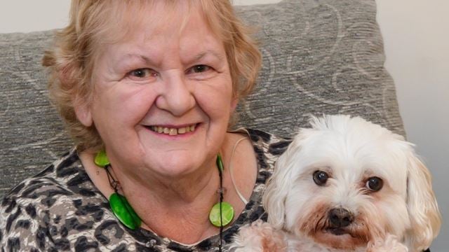 Applegate House homeowner Mary Strange and her dog Pepsi