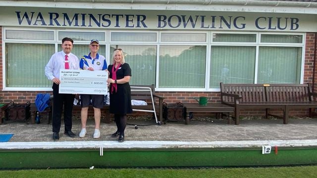 The McCarthy & Stone team from our over 60s retirement housing in Warminster, Wiltshire, give £500 to Warminster Bowls Club