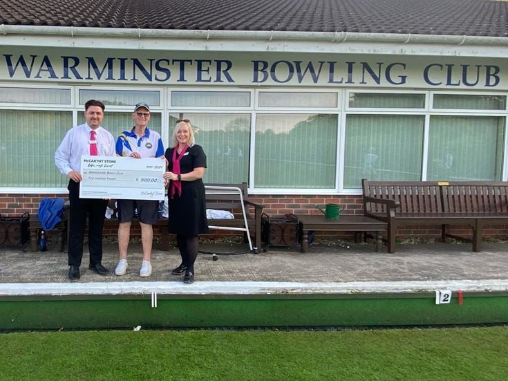 The McCarthy & Stone team from our over 60s retirement housing in Warminster, Wiltshire, give £500 to Warminster Bowls Club