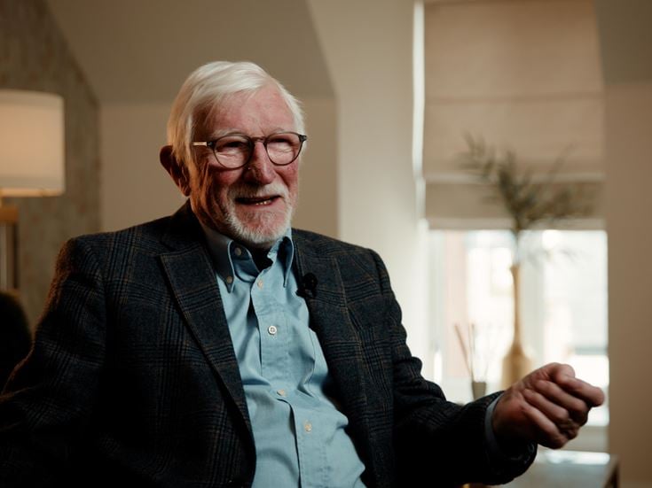 a man with glasses smiling, renting with McCarthy & Stone