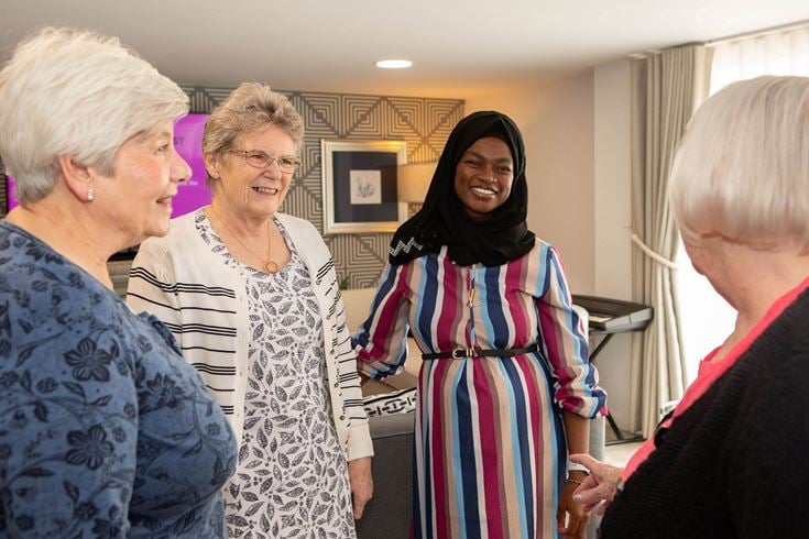 Elderton Place homeowner Gillian Harwood with House Manager Fatima and other homeowners