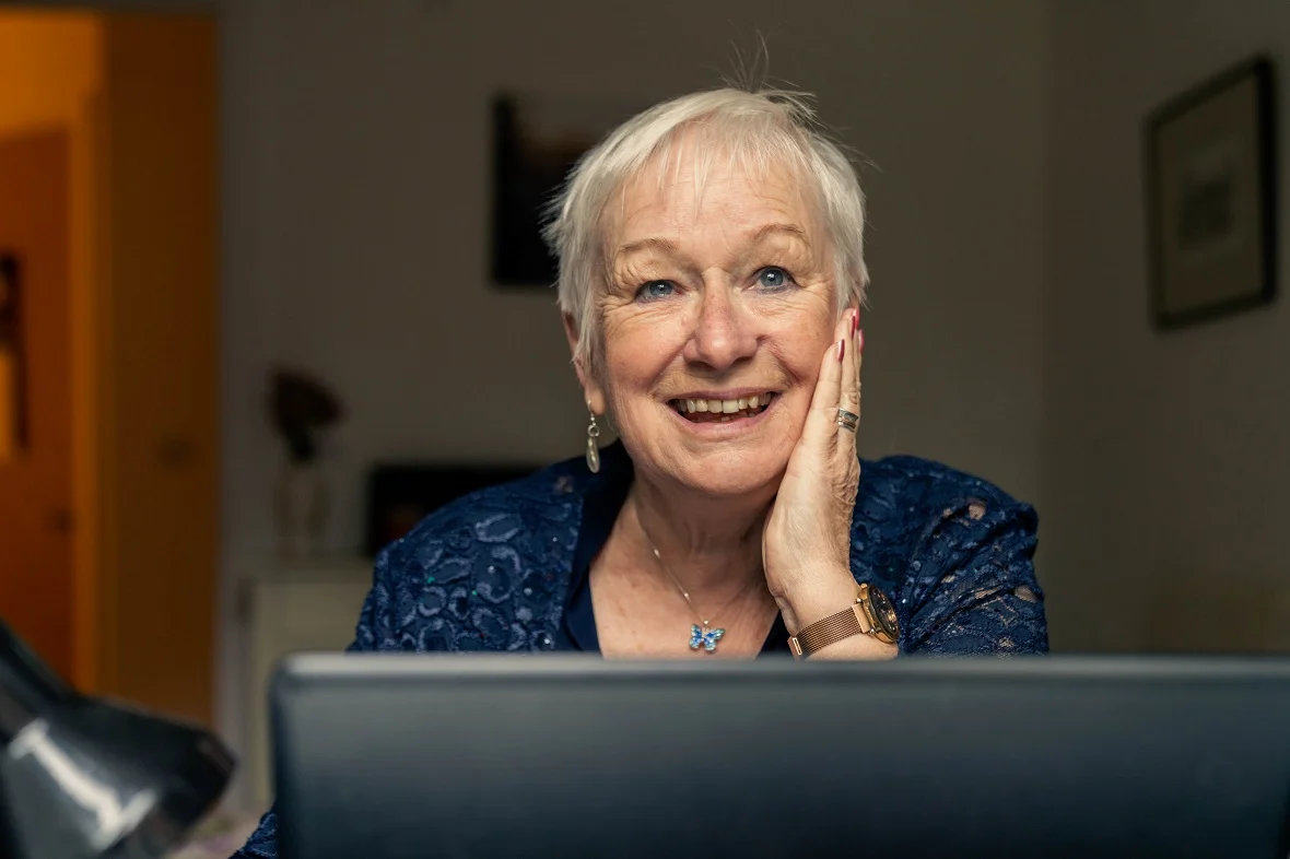 a woman smiling at the camera