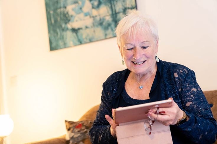 a woman holding a book