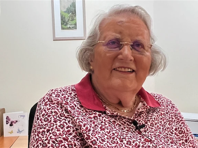 a woman wearing glasses