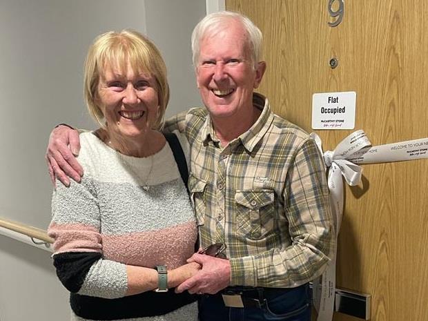 Roger and Sandra Davis outside their new home at the Pottery in Clevedon