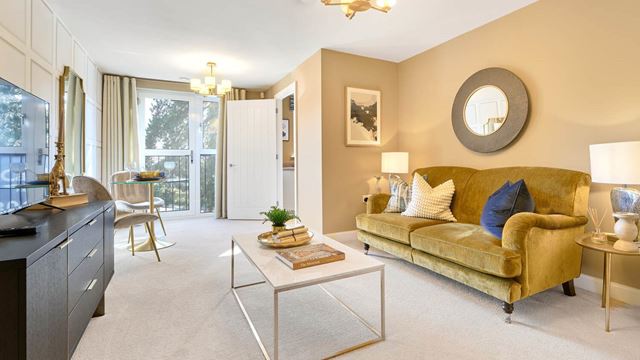 a living room with a couch and a coffee table