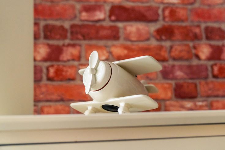 a white rabbit on a shelf