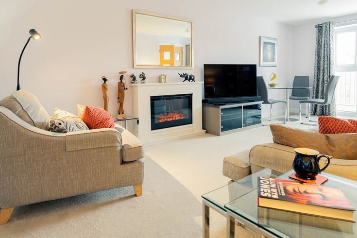a living room with a fireplace
