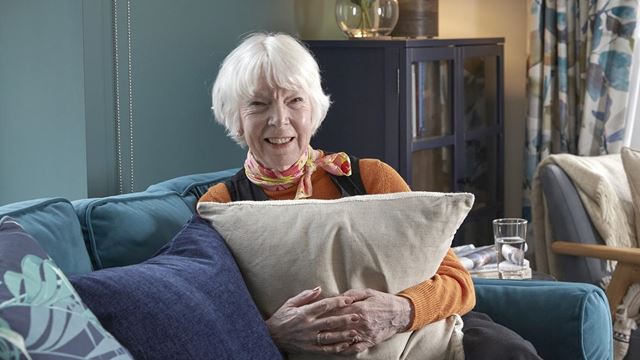 a person sitting on a couch