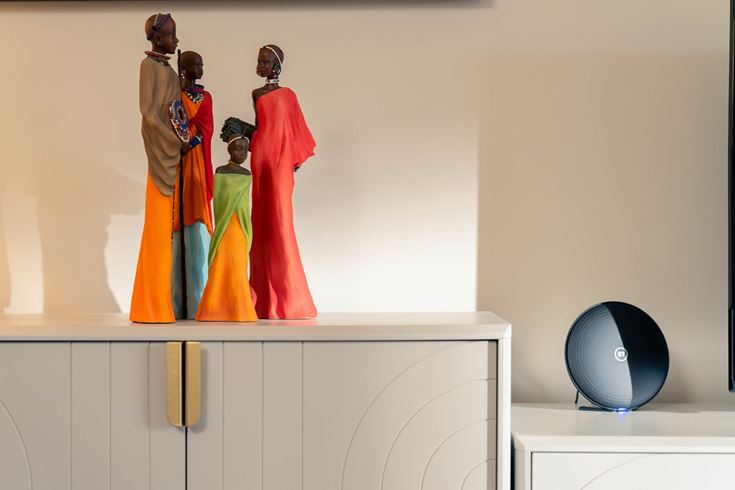 a group of statues on a shelf