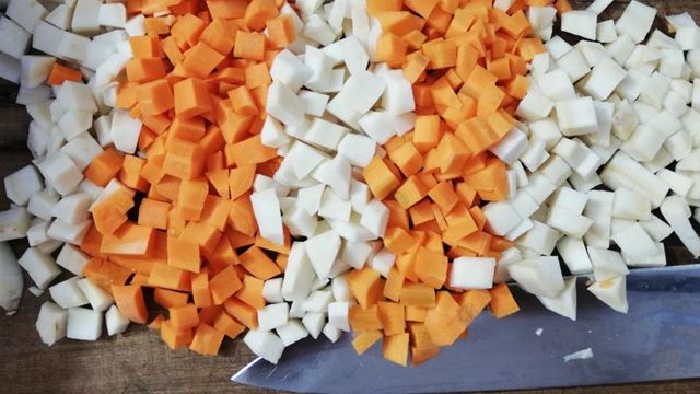 a group of cut up vegetables