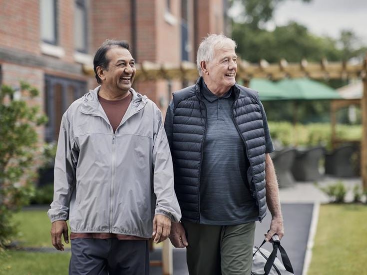a couple of men walking