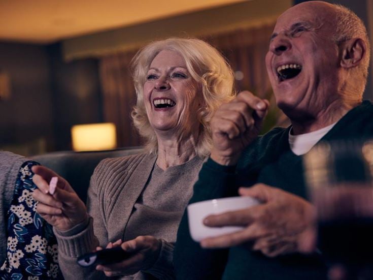 a man and a woman laughing
