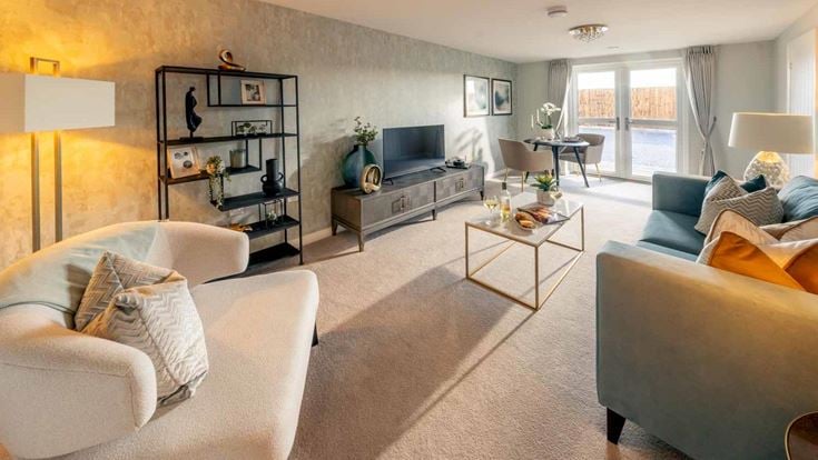 a living room with a couch and a coffee table