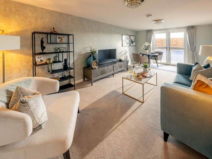 a living room with a couch and a coffee table