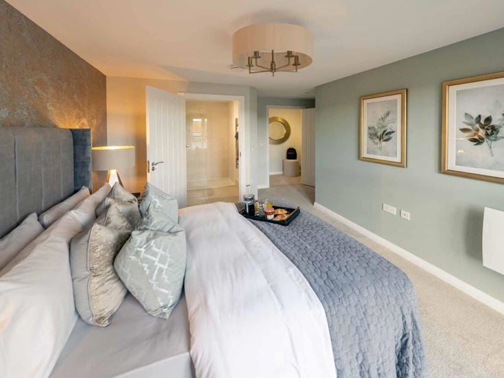 a bed with white sheets