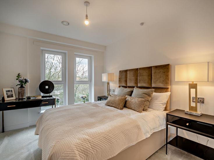 a bedroom with a large bed