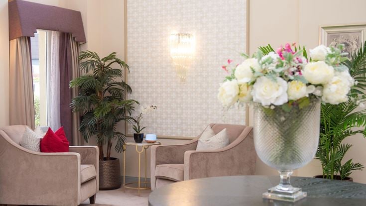 a vase of flowers on a table