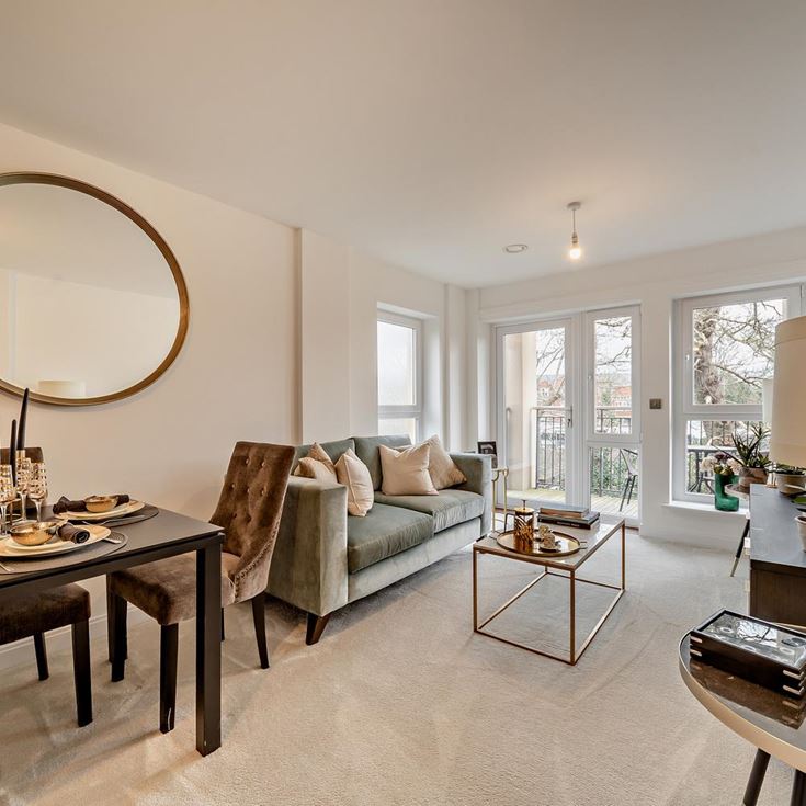 a living room with a large mirror