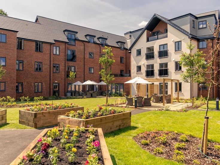 a courtyard with a few buildings