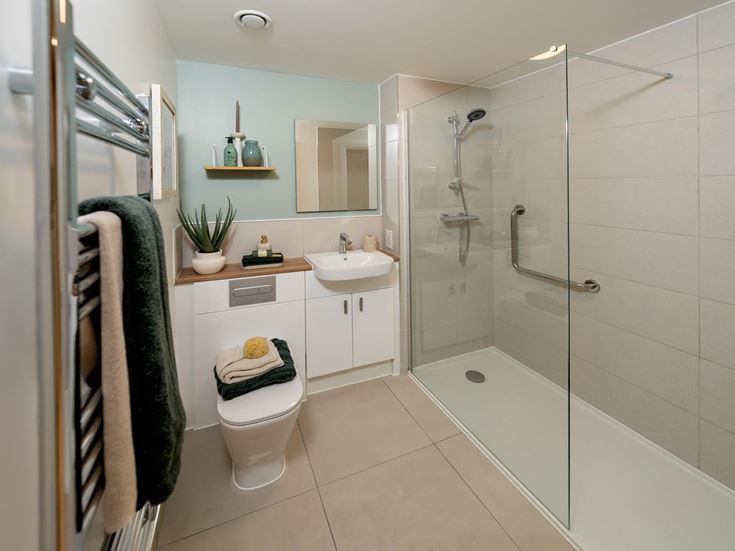 a bathroom with a glass shower