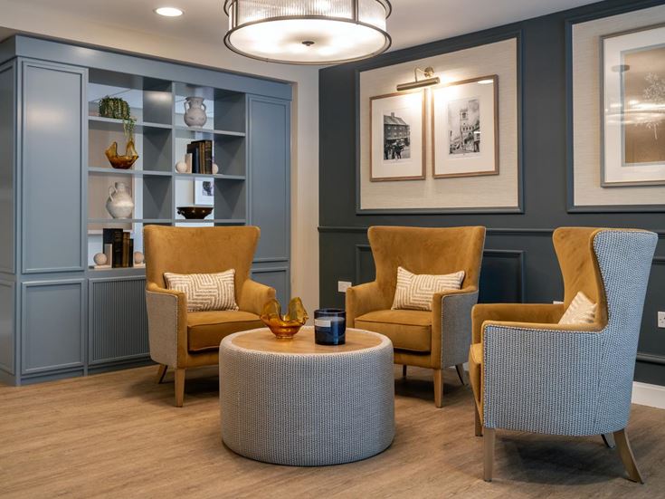 a room with chairs and a table