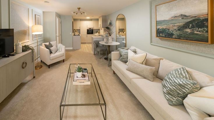 a living room with a couch and a coffee table