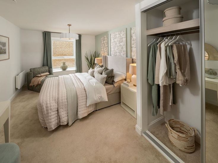 a bedroom with a bed and a closet