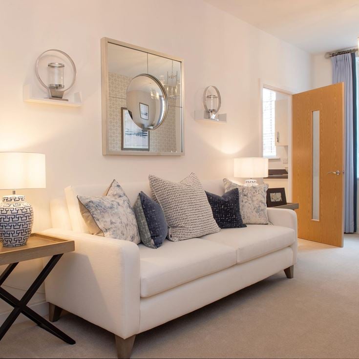 a living room with a white couch