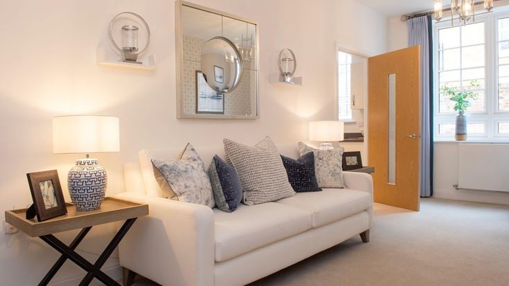 a living room with a white couch