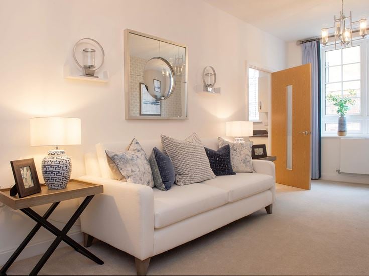 a living room with a white couch