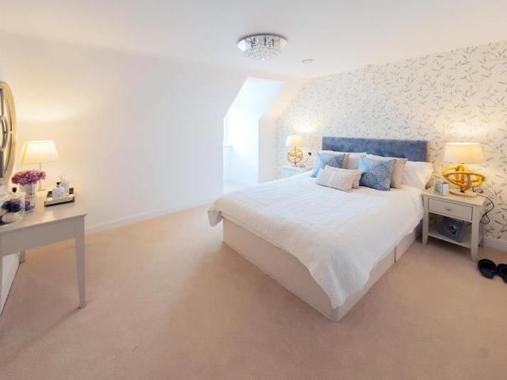 a bedroom with two beds