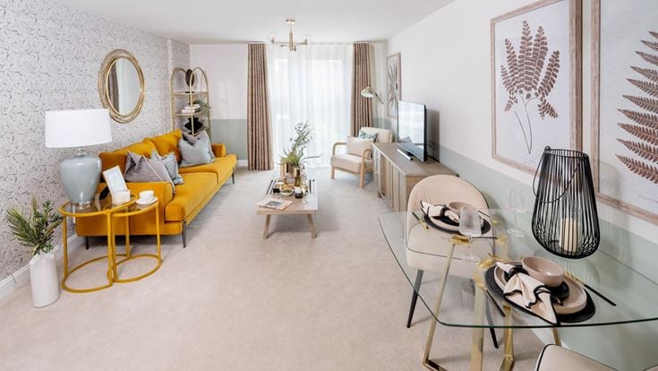 a living room with a yellow couch