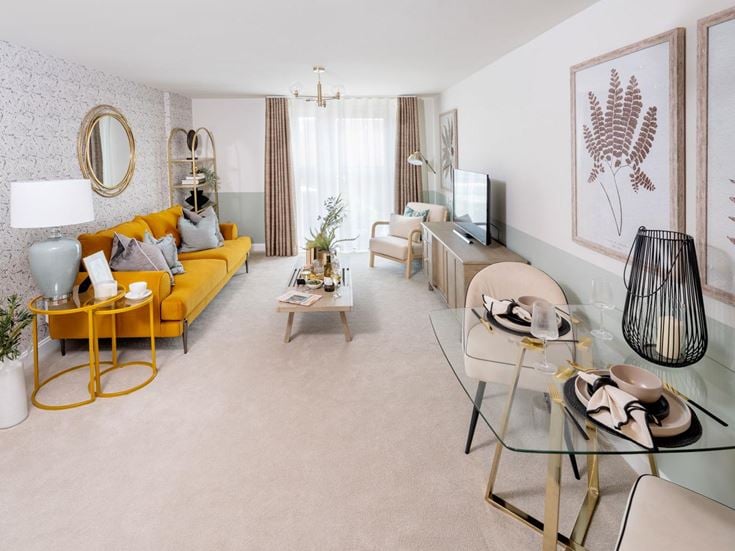 a living room with a yellow couch