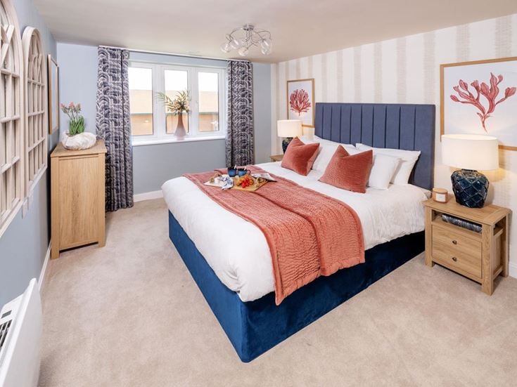a bedroom with a bed and a bookcase