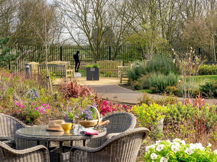 a person walking in a garden