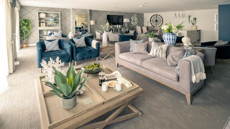 a living room with a couch and a coffee table
